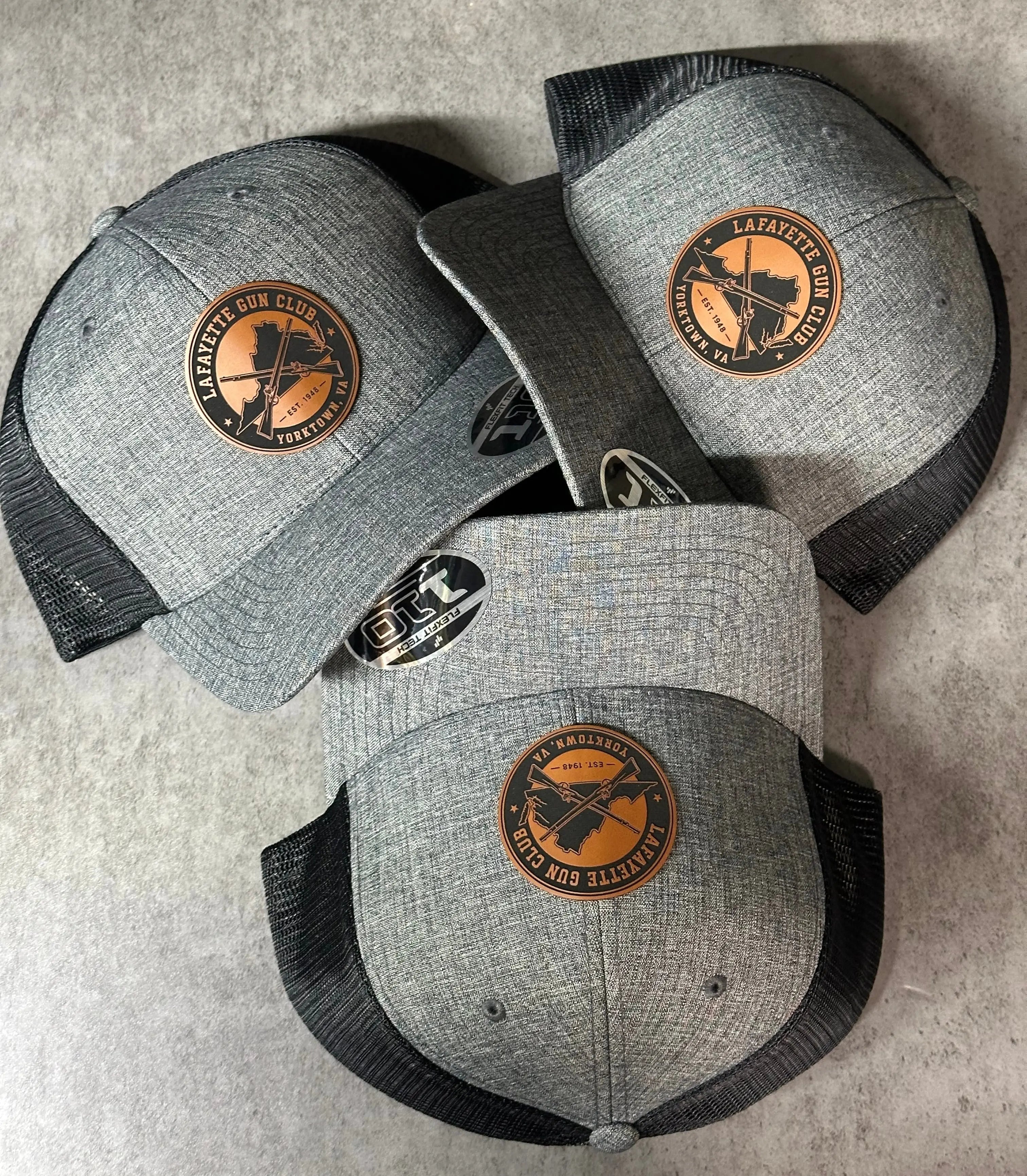 FlexFit 110 Trucker Hat + Leather Patch